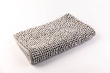 Gri kadife yumuşak banyo paspası dokusu. Banyo aksesuarları. Kapat..