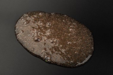 Soyut desenli, içi kabarcıklı şeffaf balçık. Çocuk oyuncağı sümüğü..