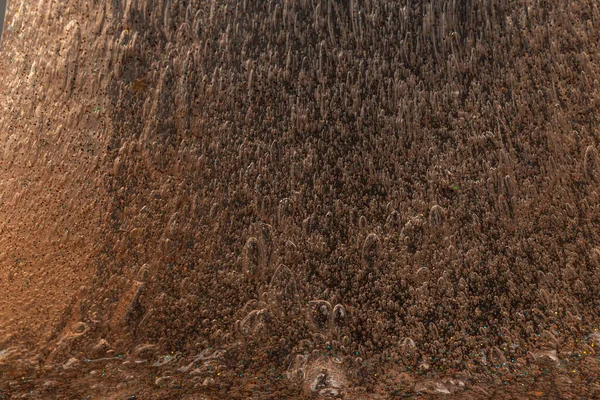 Soyut desenli, içi kabarcıklı şeffaf balçık. Çocuk oyuncağı sümüğü..