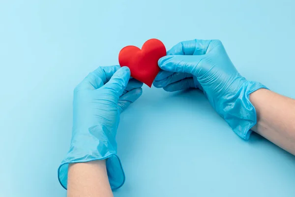 Female Medicine Doctor Hands Holding Covering Red Toy Heart Closeup — Stock Photo, Image