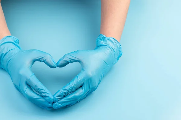 Person Latex Gloves Showing Heart Gesture Light Blue Background Closeup — Stock Photo, Image