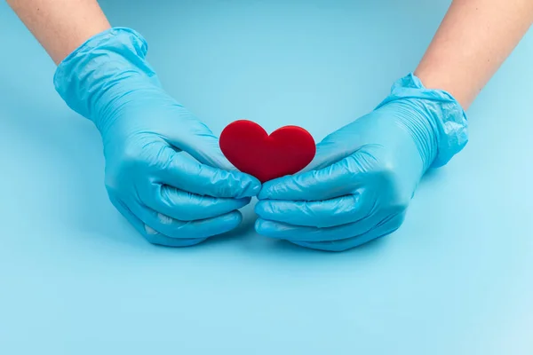 Female Medicine Doctor Hands Holding Covering Red Toy Heart Closeup — Stock Photo, Image