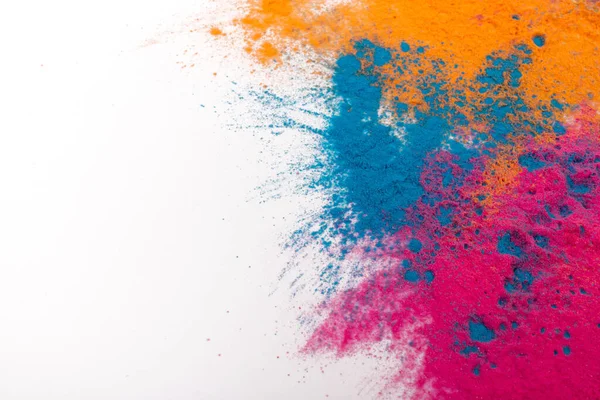 Soyut sprey tozu arkaplanı. Beyaz arka planda renkli barut patlaması. Renkli bir bulut. Renkli toz patlar. Holi boyası.