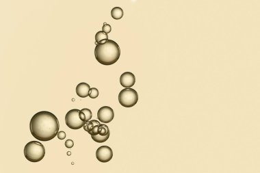 Güzel altın baloncuklar. Akan, soyut.