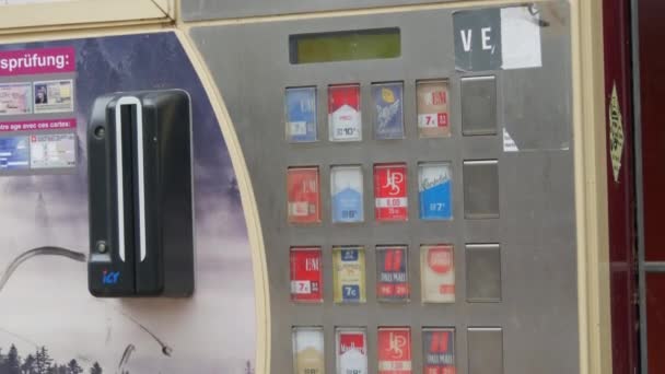 November 22, 2021 - Kehl, Germany: A special cigarette machine where you can buy cigarettes, written in German — Stock Video