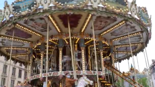 STRASBOURG, FRANCE - MAY 23, 2021: Working and spinning carousel on which children ride — Video