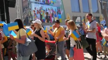June 25, 2022 - Offenburg, Germany: Ukrainians in national costumes with embroidered shirts with Ukrainian symbols and flags in demonstration support of Ukraine against war with Russia.