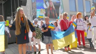 June 25, 2022 - Offenburg, Germany: Ukrainians in national costumes with embroidered shirts with Ukrainian symbols and flags in demonstration support of Ukraine against war with Russia.