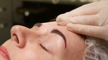 Eyebrow Waxing. Special procedure after permanent dyeing of eyebrows. Microblading
