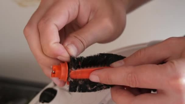 Mans Hand Cleans Brush Smart Robot Vacuum Cleaner Hair Dirt — Stockvideo