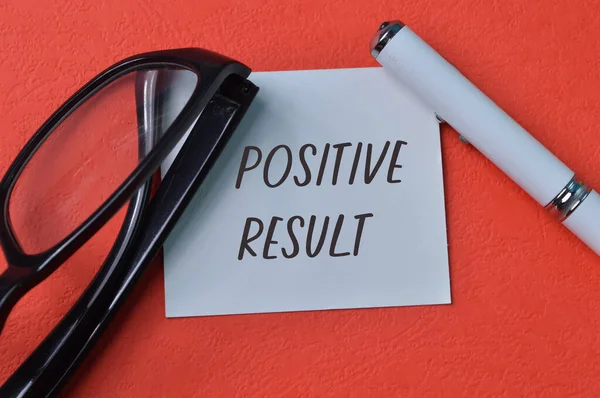 Eyeglasses Pen White Paper Text Positive Result — Fotografia de Stock