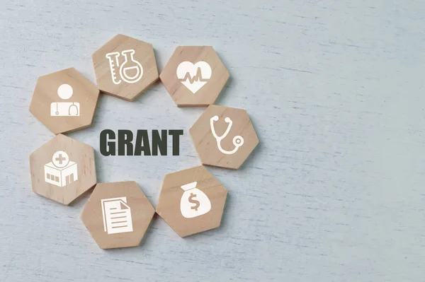 用健康和商业符号创作Grant — 图库照片