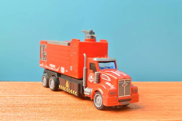 Plastic Toy Red Truck Wooden Table — Zdjęcie stockowe