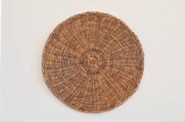 Round woven placemat isolated on a white background