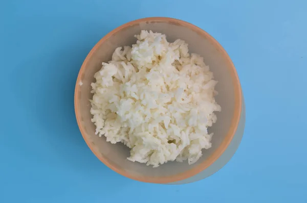 Cooked White Rice Plastic Bowl Isolated Blue Background — Stock Photo, Image