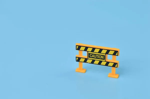 Caution Sign Isolated Blue Background Maintenance Repair Construction Safety Concept — Stock Photo, Image