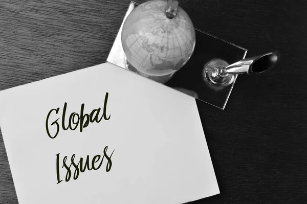Earth Globe White Paper Written Global Issues —  Fotos de Stock