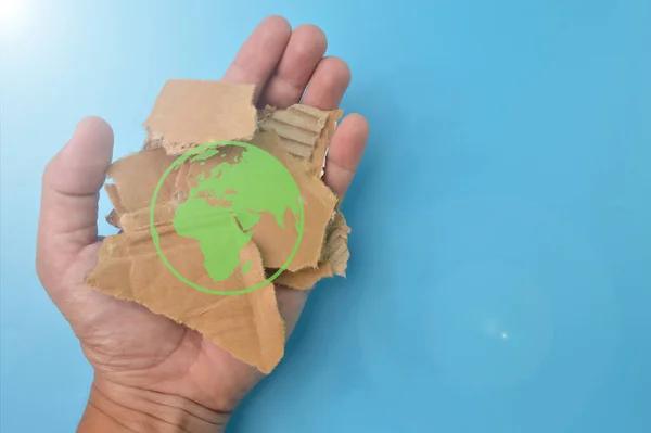 Hand Holding Brown Torn Cardboard Earth Symbol Eco Earth Concept — Stock fotografie