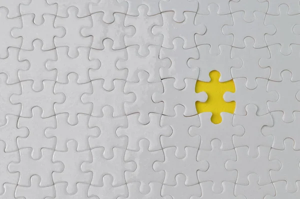 Incomplete White Jigsaw Puzzle Pieces Flat Lay View — Foto de Stock