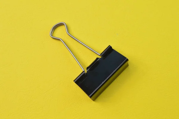 Paper Clip Isolated Yellow Background — Zdjęcie stockowe