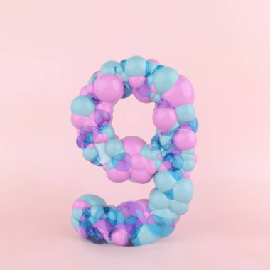 Renkli pastel balonlardan yapılmış dokuz numaralı yaratıcı kavram. Pastel pembe arka planda balon yazı tipi kavramı.