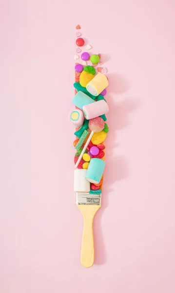 Creative Junk Food Concept Paint Brush Leaves Tasty Candy Instead — Foto de Stock
