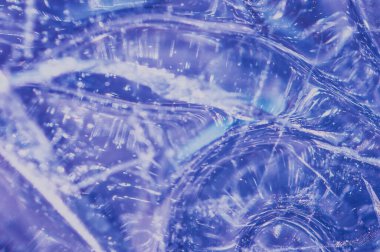 Saf su kavramının soyut dokusu. Seçici odaklanma. El salla, girdap yap ve sıçra. Yazı veya logo eklenecek yer.