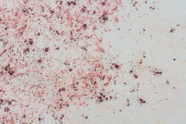 Küçük pembe ve mor boya parçacıkları olan soyut duvar kağıdı