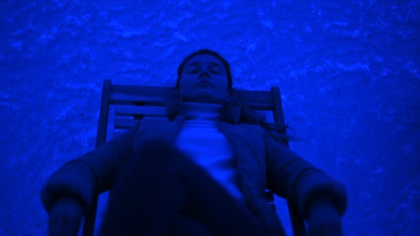 Woman Relaxing Wooden Chair Salt Room Blue Light — Stock Video