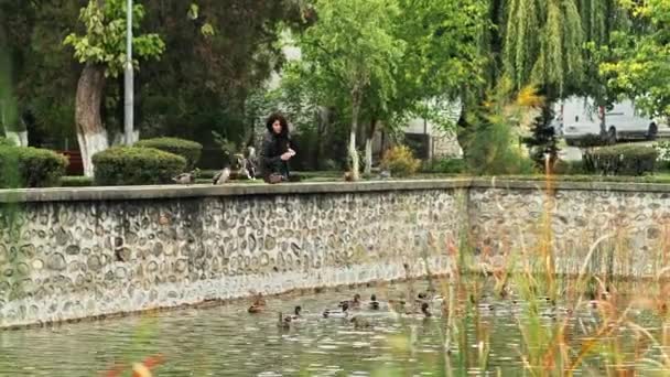 Sighisoara Romania October 2021 Brunette Woman Feeding Ducks Pond — Stock Video