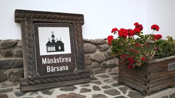 View Barsana Monastery Sign Ground Flowers Romania — Stockvideo