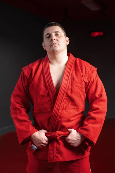 Martial Arts Fighter Red Kimono Posing Holding His Belt — Stock Photo, Image