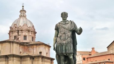 Statue of Julius Caesaer located in the centre of Rome, Italy. Buildings on the background