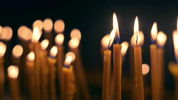 Close View Lots Burning Candles Black Background Slow Motion — Vídeo de Stock