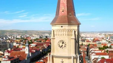 Aerial drone view of Saint Michael Church in Cluj, Romania. Cityscape, central square, old buildings