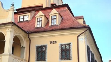 Close view of the County Museum of History facade and tower in old Brasov centre, Romania