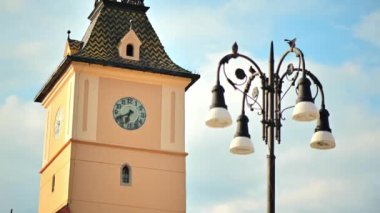 Close view of the County Museum of History and a lamp post in old Brasov centre, Romania