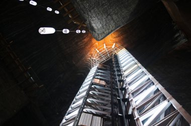 Salina Turda salt mine in Romania. Elevator with illumination