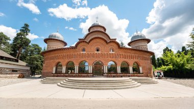 Curtea de Arges Monastery in Romania. Church and greenery around