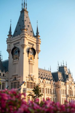 View of the Palace of Culture in Iasi downtown, Romania. Flowers on the foreground