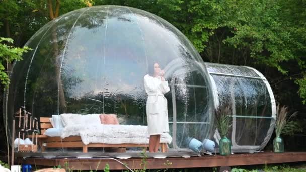 Transparent Bubble Tent Glamping Lush Forest Interior Woman Cup Looking — Stock video