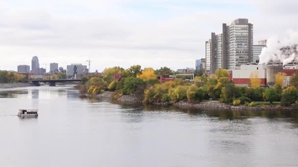 Cityscape of Gatineau city of Quebec and Ottawa River with sailing boat in Canada in fall — Stock Video