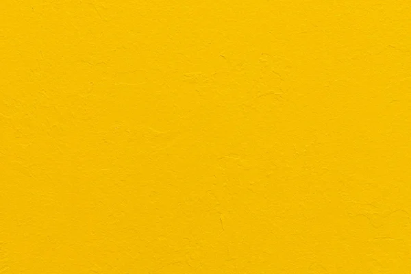 Abstract bright yellow painted wall background — Stockfoto