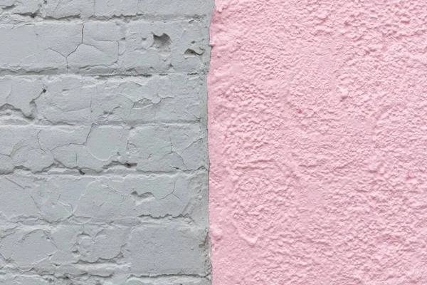 Light pink stone and grey brick painted wall texture background close-up. — 图库照片