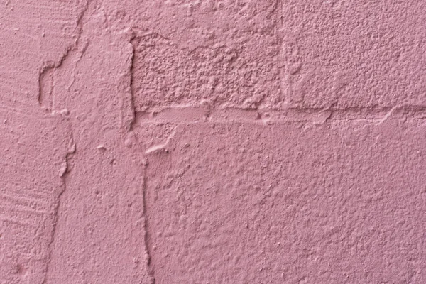 Abstract pink painted old brick wall background — Stockfoto