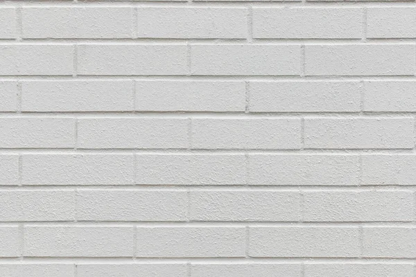 Grey brick painted wall textured background close-up. — 图库照片