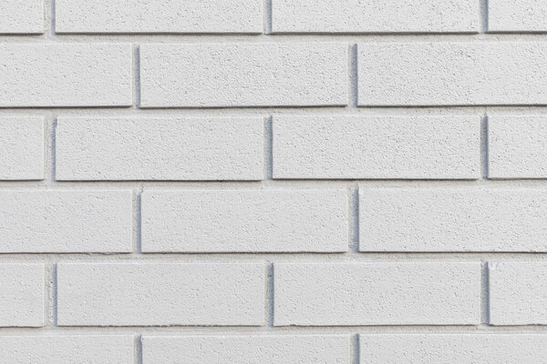 Close up of painted grey brick wall texture background.