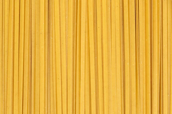 Uncooked Dry Durum Fettuccine Pasta Closeup Raw Spaghetti Full Frame — Stock Photo, Image