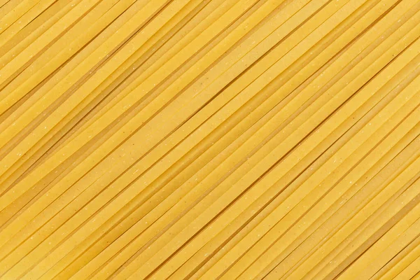 Tagliatelle Durum Primo Piano Spaghetti Crudi Sfondo Pasta Fettuccine Full — Foto Stock