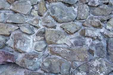 Taştan arka plan duvarı. Duvar kağıdı büyük kaldırım taşları.